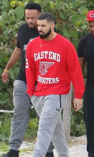 Drake wearing OVO pants