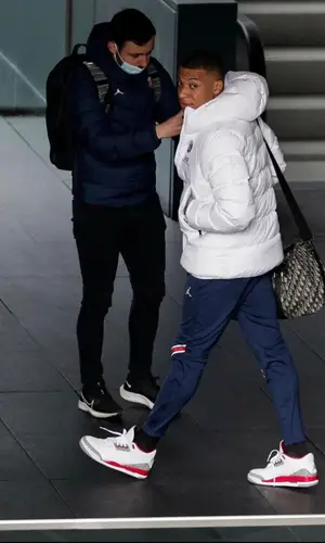 Kylian Mbappe wearing Nike pants