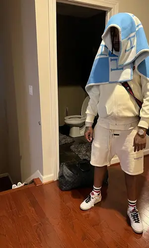Babyface Ray wearing Gucci sock