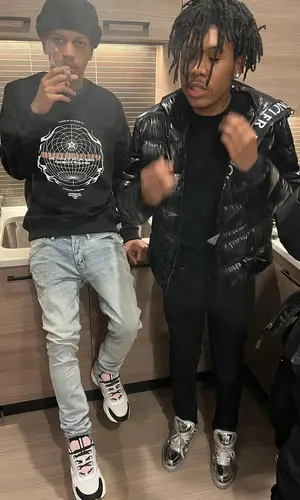 Iayze wearing Dior sneakers