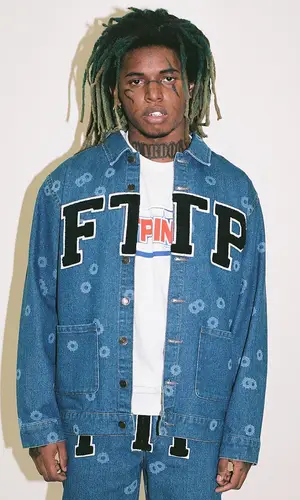 ZillaKami wearing Fuck The Population jacket