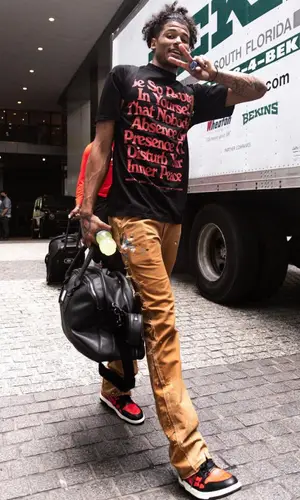 Jalen Green’s Outfit in Do Not Disturb. T-Shirt, Gallery Dept. Pants & Amiri Sneakers (2022)