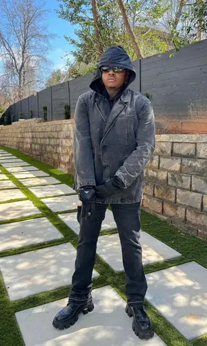 Gunna wearing Prada glov