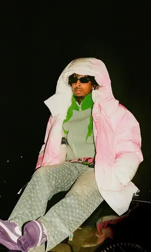 21 Savage wearing Louis Vuitton sneakers
