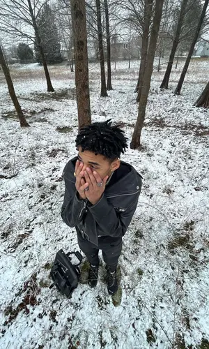 TheHxliday wearing Dr. Martens backpack