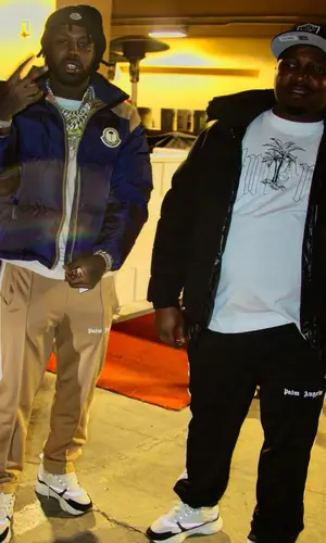 EST Gee wearing Moncler hat
