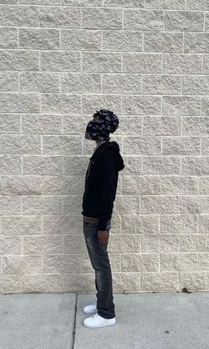 Onlybino wearing SANITY! hat