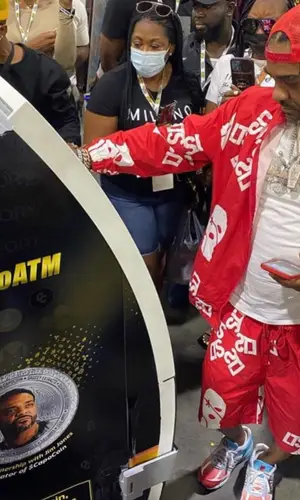 Jim Jones wearing Local Trap Star shorts