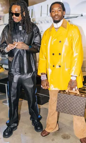 Offset wearing Louis Vuitton bag