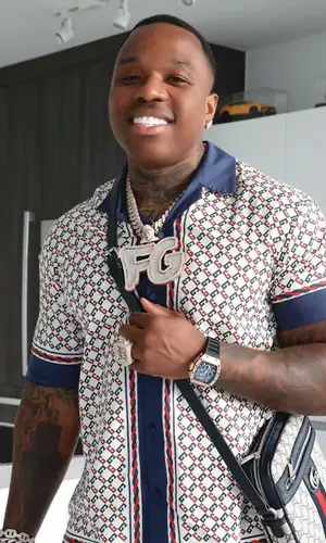 BandMan Kevo wearing Gucci shirt