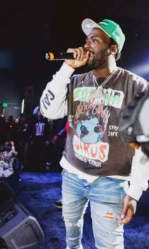 Peezy wearing Gallery Dept. sweatshirt