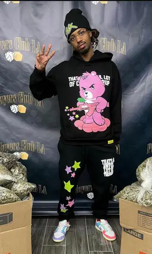 Metro Boomin wearing Awful Lot of Cough Syrup hoody