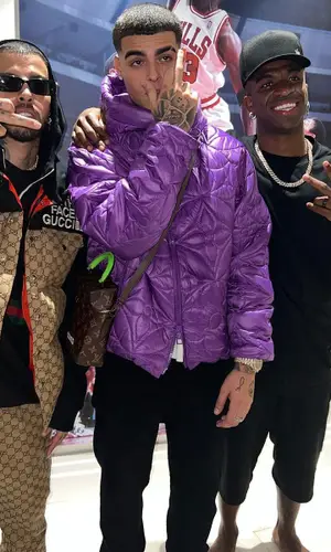 Rauw Alejandro wearing Gucci jacket