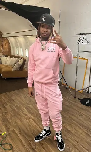 Lil Keed’s Outfit in Selfpaid Pants, Vans Sneakers & New Era Cap (2022)