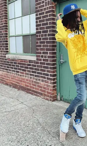 Baby Smoove’s Outfit in Young Thug Merch Hoodie, New Era Cap & Spider Worldwide (2022)