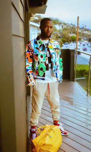 Shy Glizzy wearing Prada sneakers