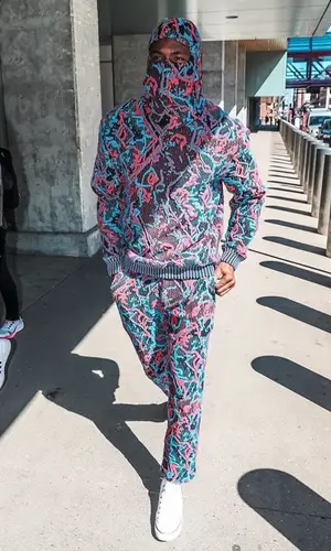 Thanasis Antetokounmpo’s Outfit in Kozha Trousers & Converse Sneakers (2022)