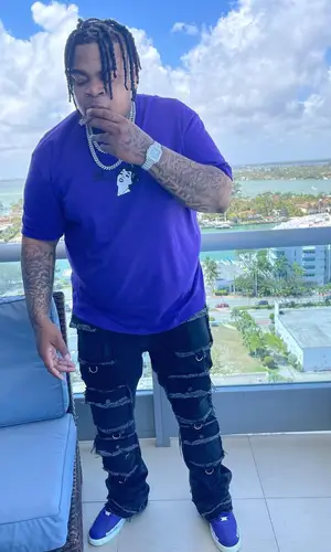Big Yavo wearing Nike sneakers