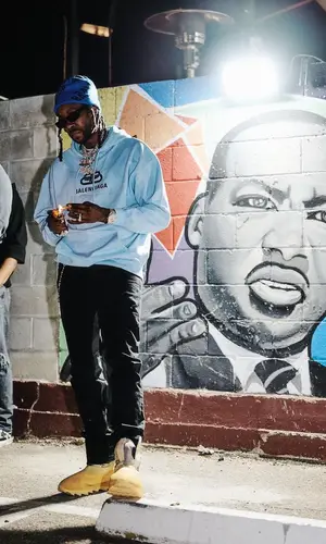 2 Chainz’s Outfit in Lanvin Jeans, Balenciaga Hat & Gallery Dept. (2022)