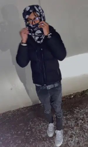 Lil Benny wearing Louis Vuitton belt