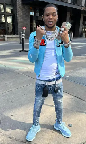 Lil Migo wearing Balenciaga sneakers