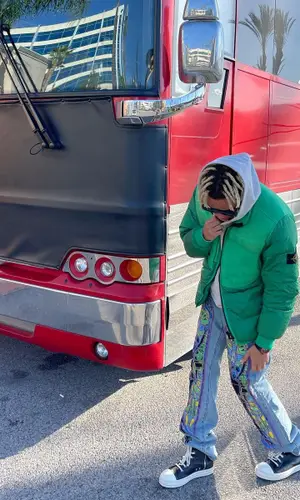 Cordae wearing Stone Island jacket