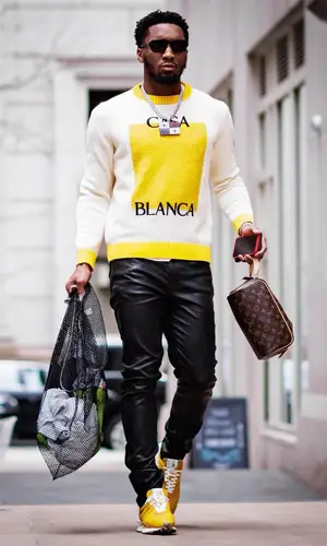 Donovan Mitchell’s Outfit in Casablanca Sweater, Hudson Jeans & Lanvin Sneakers (2022)