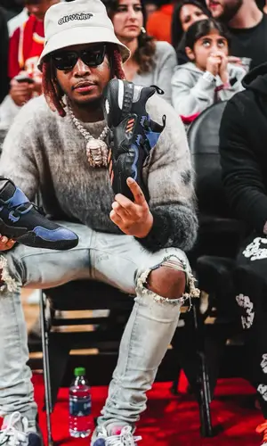Lil Keed’s Outfit in Off-White Sneakers & Adidas (2022)
