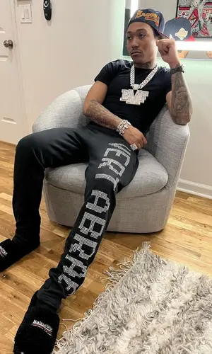Lil Meech wearing Balenciaga sandal