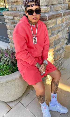 Young M.A’s Outfit in Nike Sneakers, Louis Vuitton Eyewear & Casablanca Socks (2022)