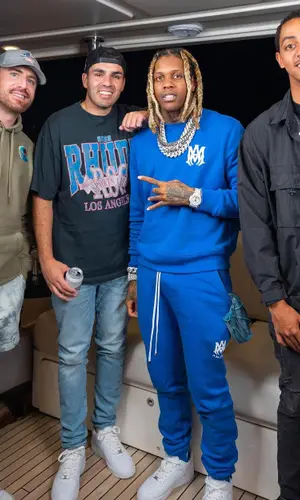 Lil Durk wearing Amiri pants