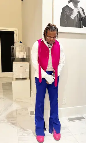 Gunna wearing Louis Vuitton trousers