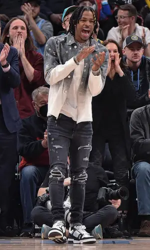 Ja Morant wearing Amiri jeans