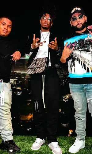 Smiley wearing Ferragamo belt