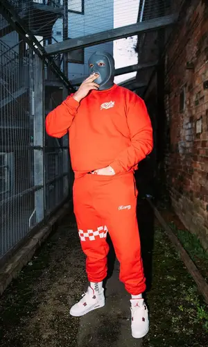 M Huncho wearing Jordan sneakers