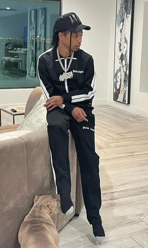 Pressa wearing Amiri hat