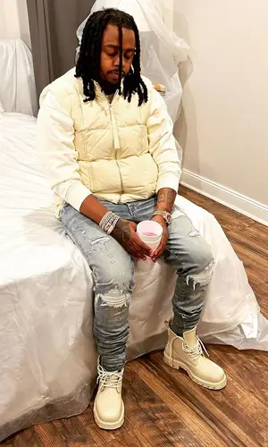 Babyface Ray wearing Jil Sander jacket