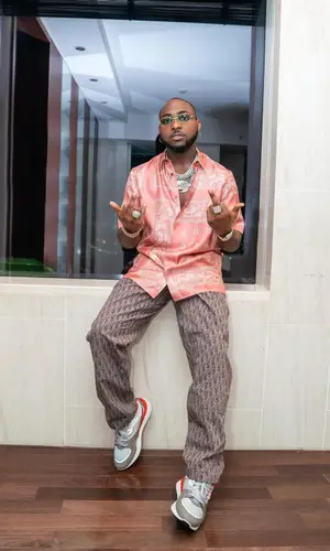 Davido wearing Dior shirt