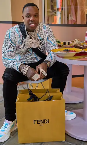 BandMan Kevo wearing Fendi bag