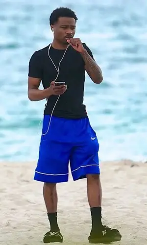 Roddy Ricch wearing Nike shorts