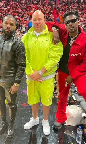 Fat Joe wearing Rhude sweatshirt