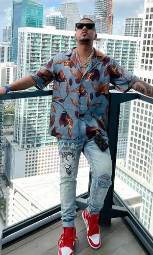Bulova wearing Amiri jeans