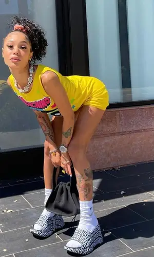 Coi Leray wearing Moschino other