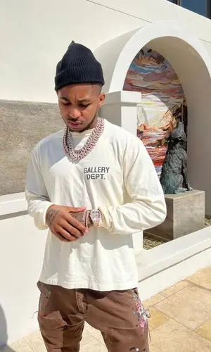DDG wearing Cartier watch