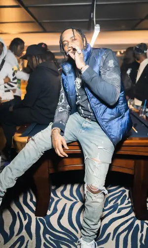 Fivio Foreign wearing Fendi sweatshirt