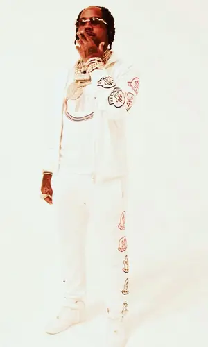 EST Gee wearing Moncler pants