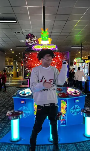 Lil Tecca wearing Low Lights Studios sweater