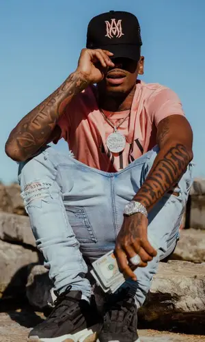 Funny Mike wearing Amiri cap