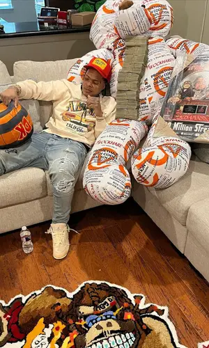Sosamann wearing Amiri sweatshirt