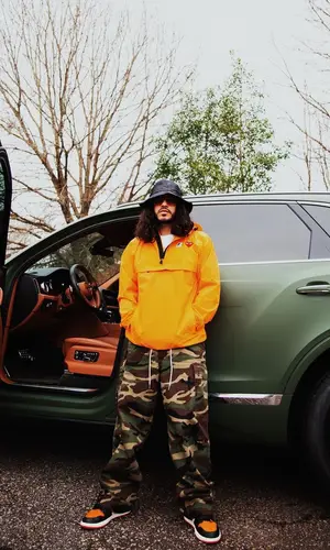 Russ wearing Comme Des Garcons jacket